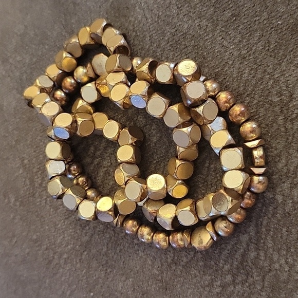 3/$30 Matte Goldtone Metal Stretch Bracelets - Picture 2 of 4